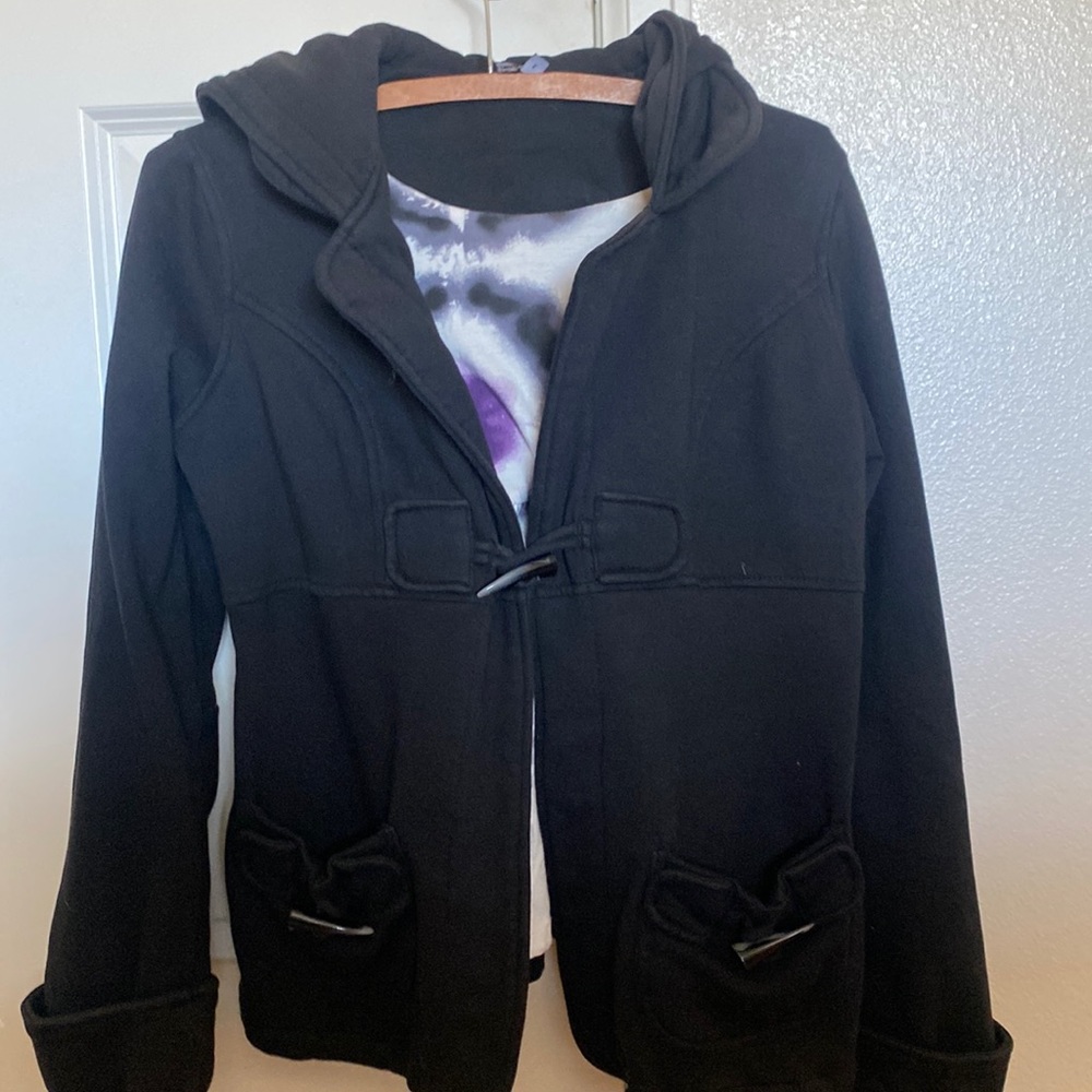 Lightly used, cute hooded jacket,. Size L in Girls but it fits like XS